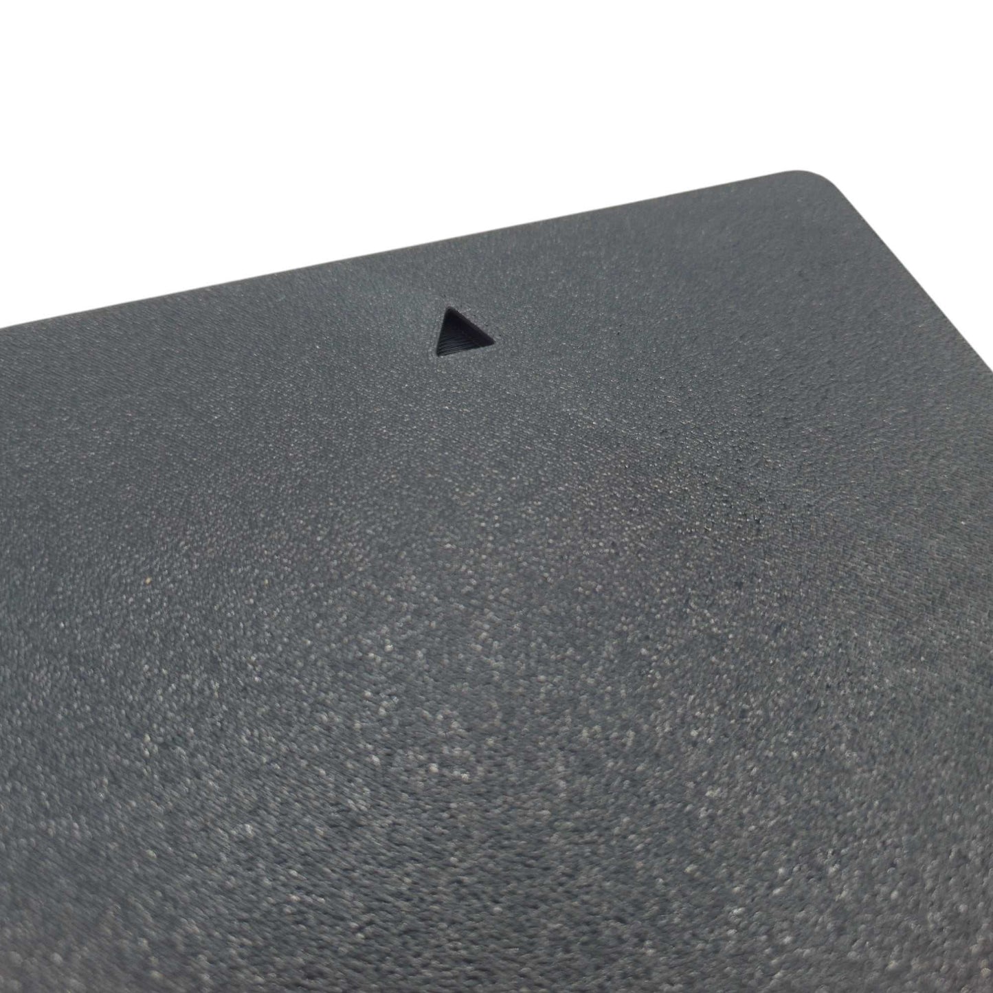 Close-up of the back of a black 3D printable office sign showing textured surface and mounting slot triangle cutout.