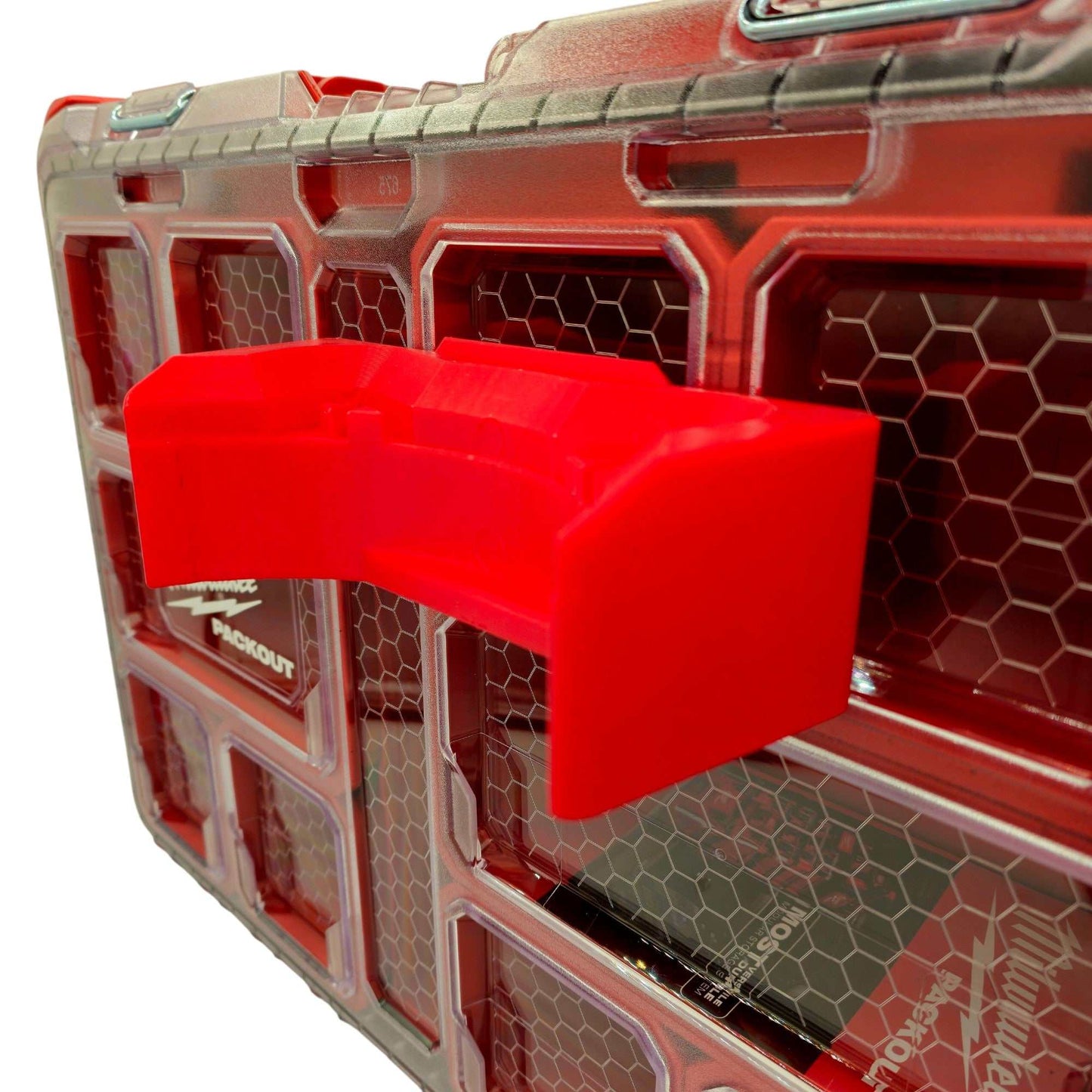 Red heavy-duty Milwaukee M18 blower packout mount securely attached to a Milwaukee Pack-out case