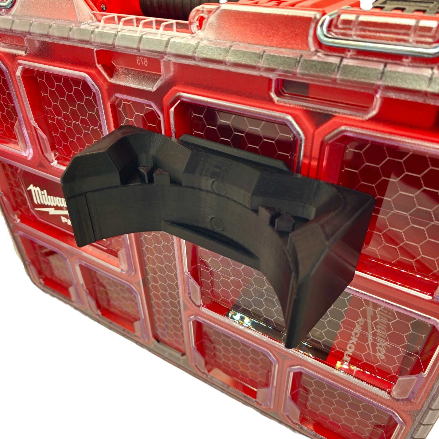 Milwaukee M18 blower packout mount heavy-duty black hook attached to red Pack-out case panel