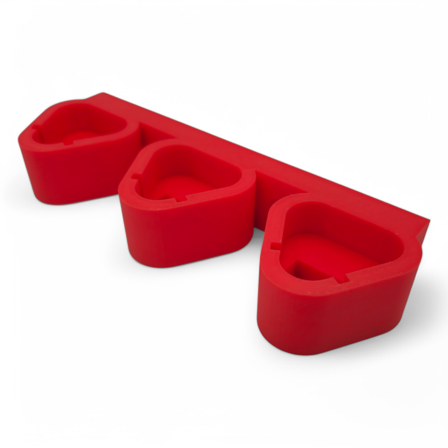 Red Milwaukee M12 battery holder with three slots for wall mounting