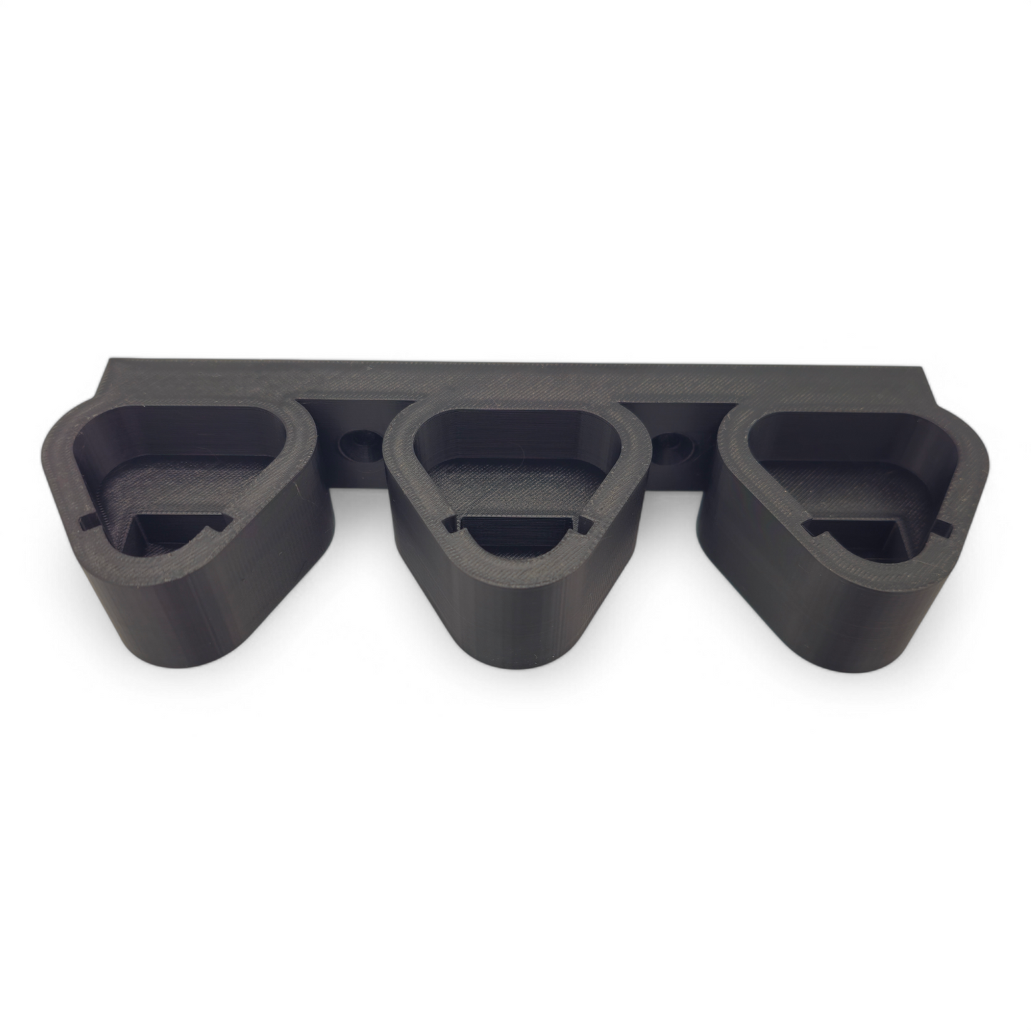 Black 3-slot M12 battery holder wall mount made from durable PETG, holds any size Milwaukee M12 batteries securely.