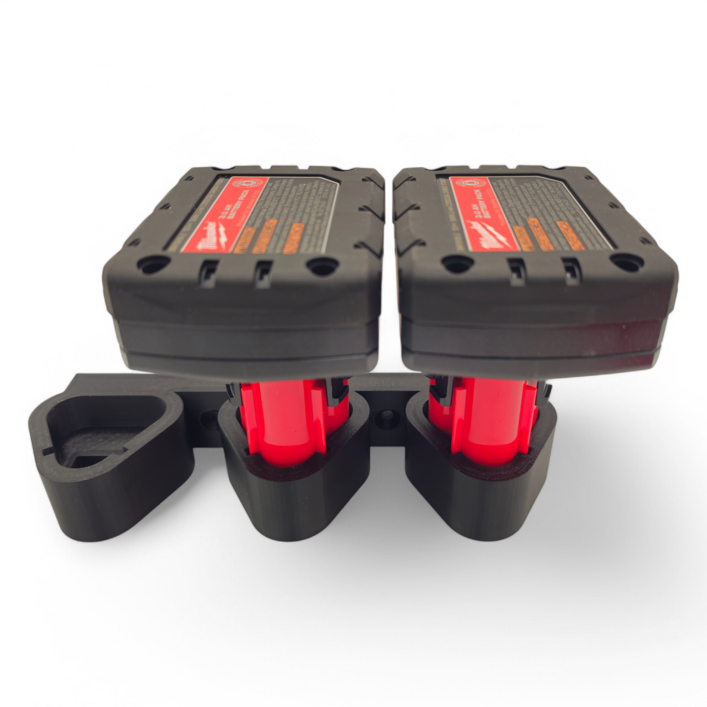 Compact black M12 battery holder wall mount with three slots for Milwaukee M12 batteries, made of durable PETG, designed for easy two-screw installation.