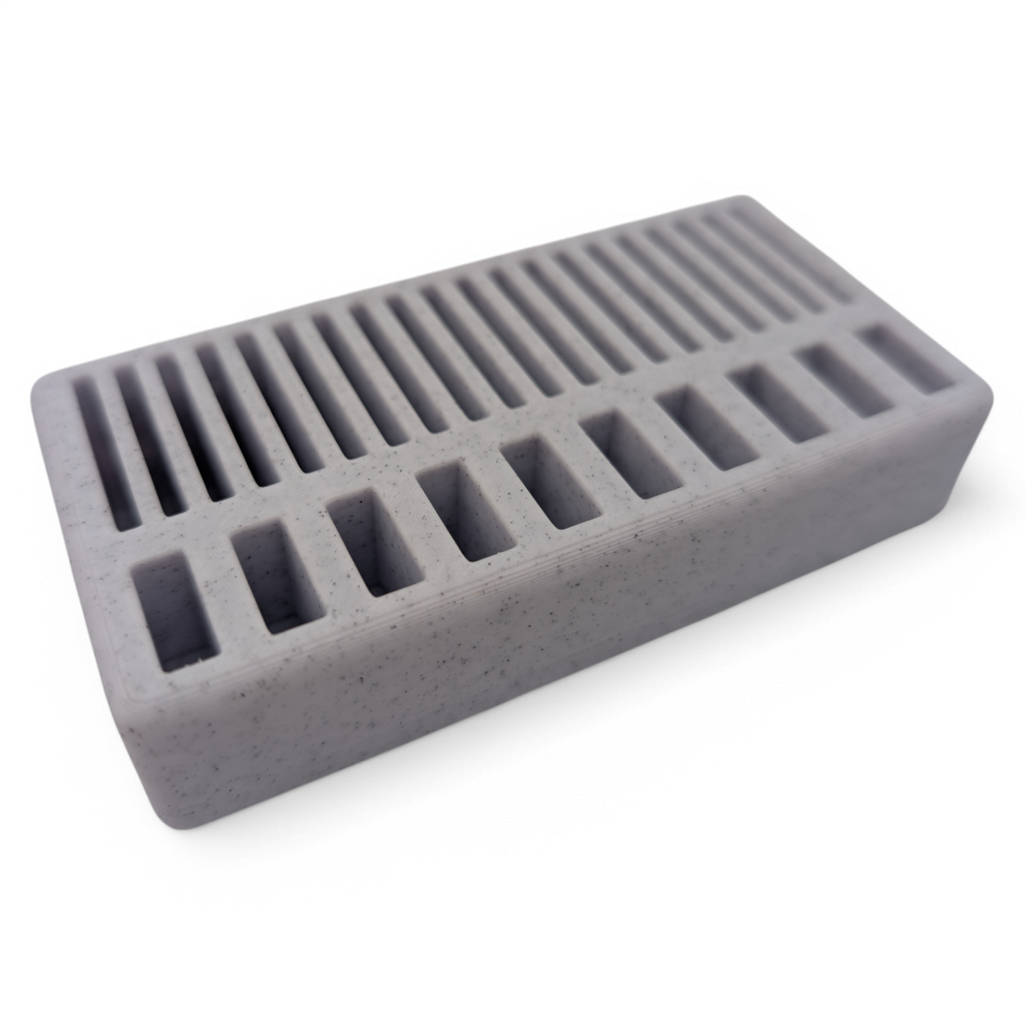 Compact USB and SD card organizer 3D printed in the USA, holds 7 USB sticks and 18 SD cards, durable and lightweight desktop storage solution.
