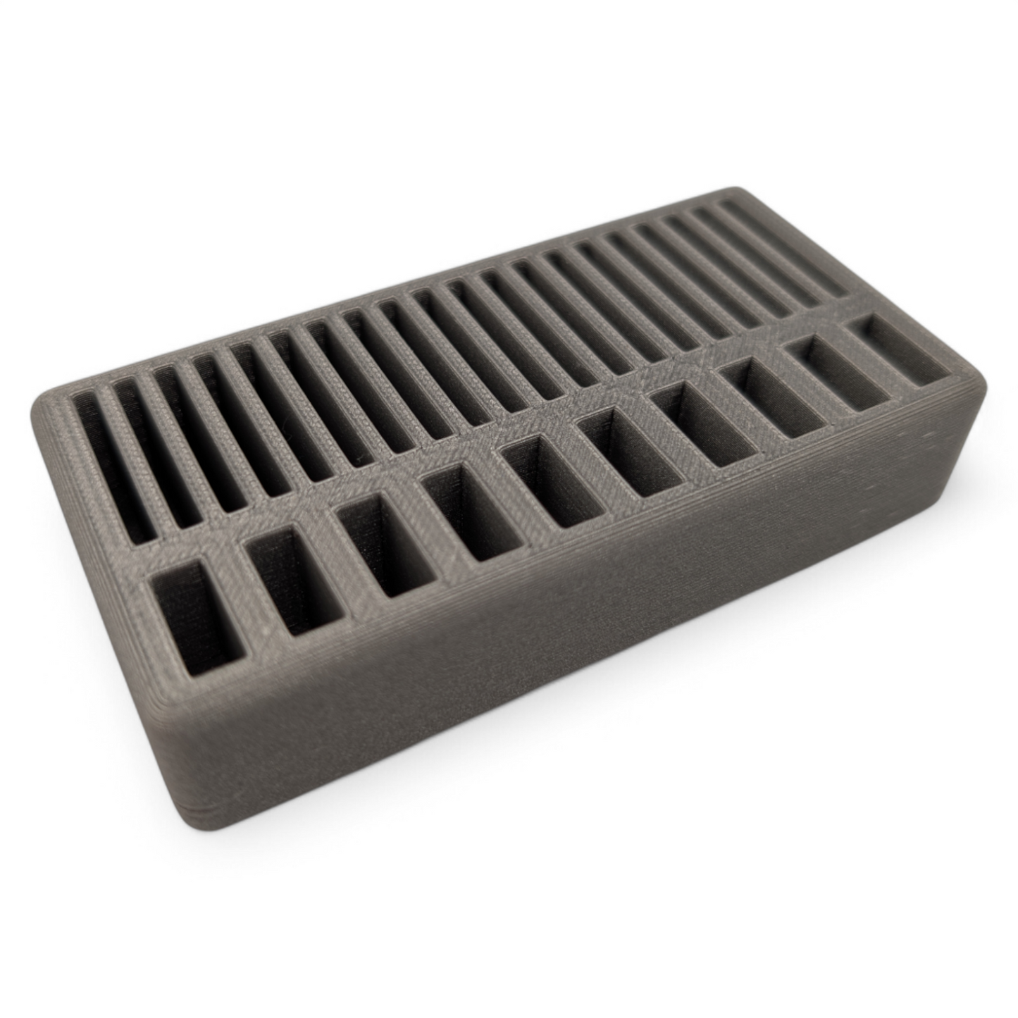 Compact 3D printed USB & SD card organizer holding 7 USB sticks and 18 SD cards, made in the USA by 3D Logic Prints.