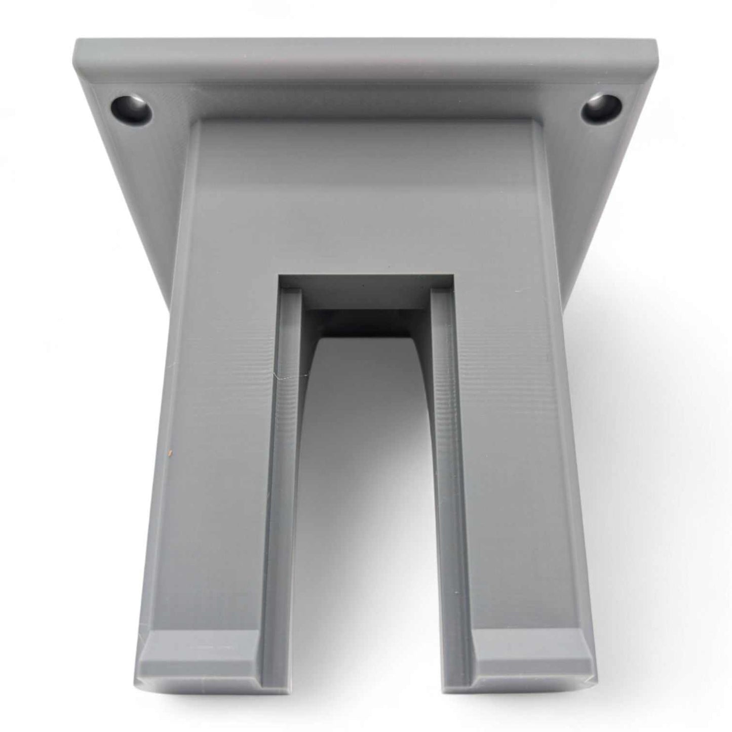 Durable wall-mounted holder for EGO string trimmer storage.