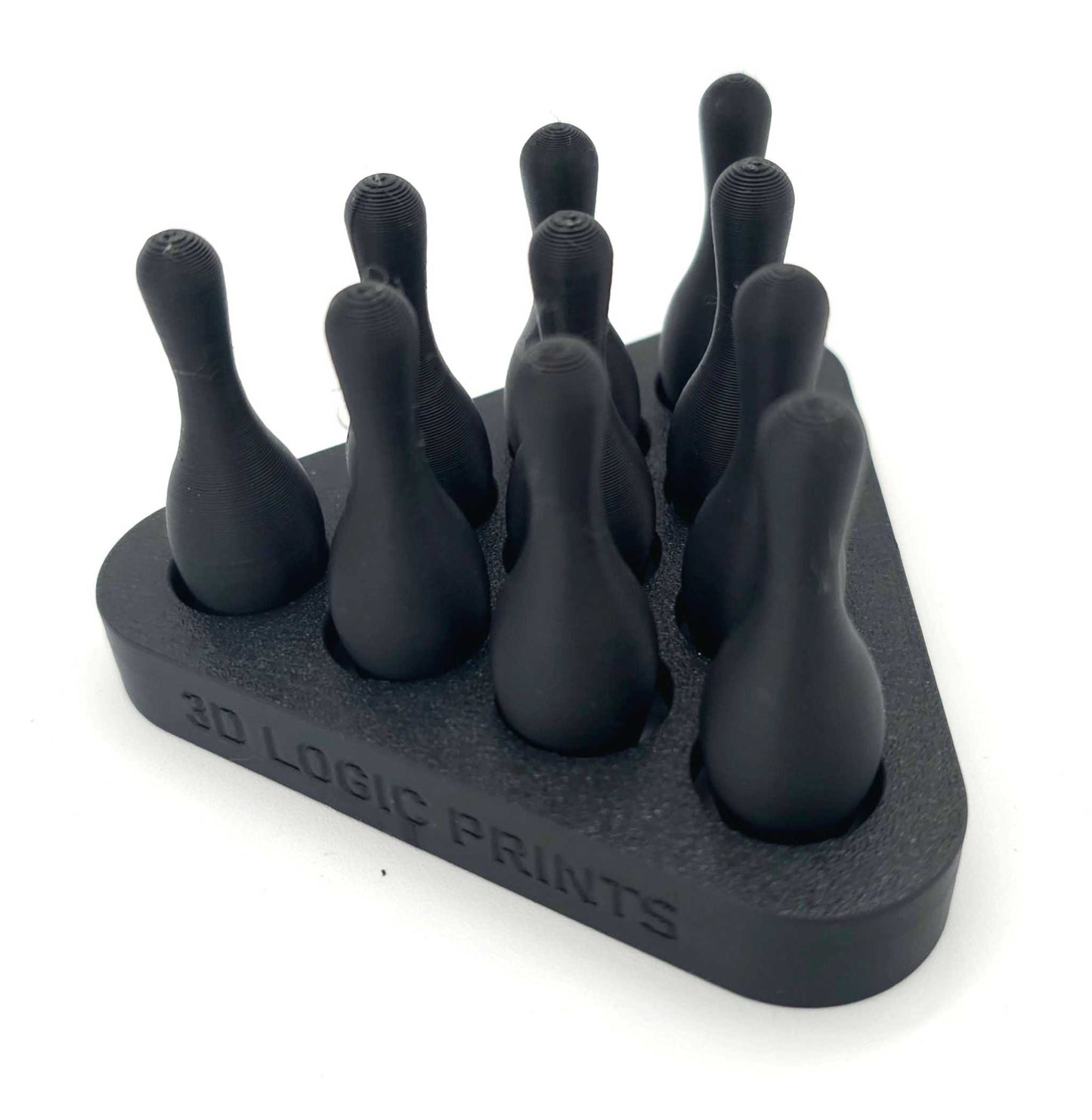 3D-printed mini bowling pins set with pin setter for desk or tabletop gaming accessory