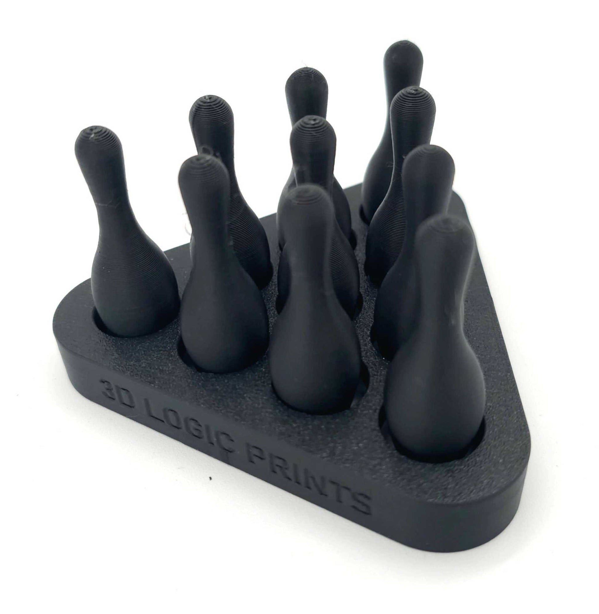 3D-printed mini bowling pins set with pin setter for desk or tabletop gaming accessory