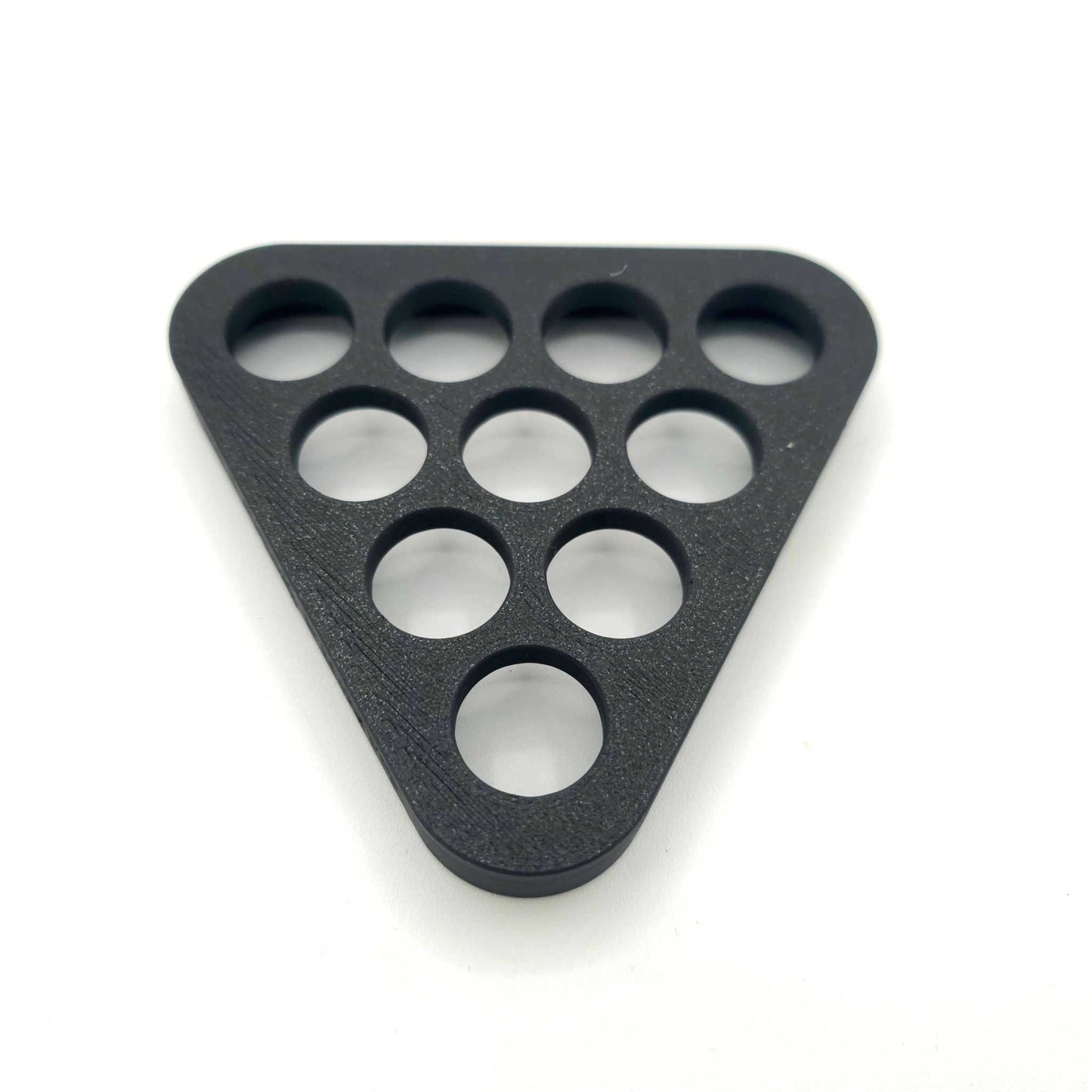 Black 3D-printed mini bowling pin setter with ten circular slots for arranging 2-inch pins