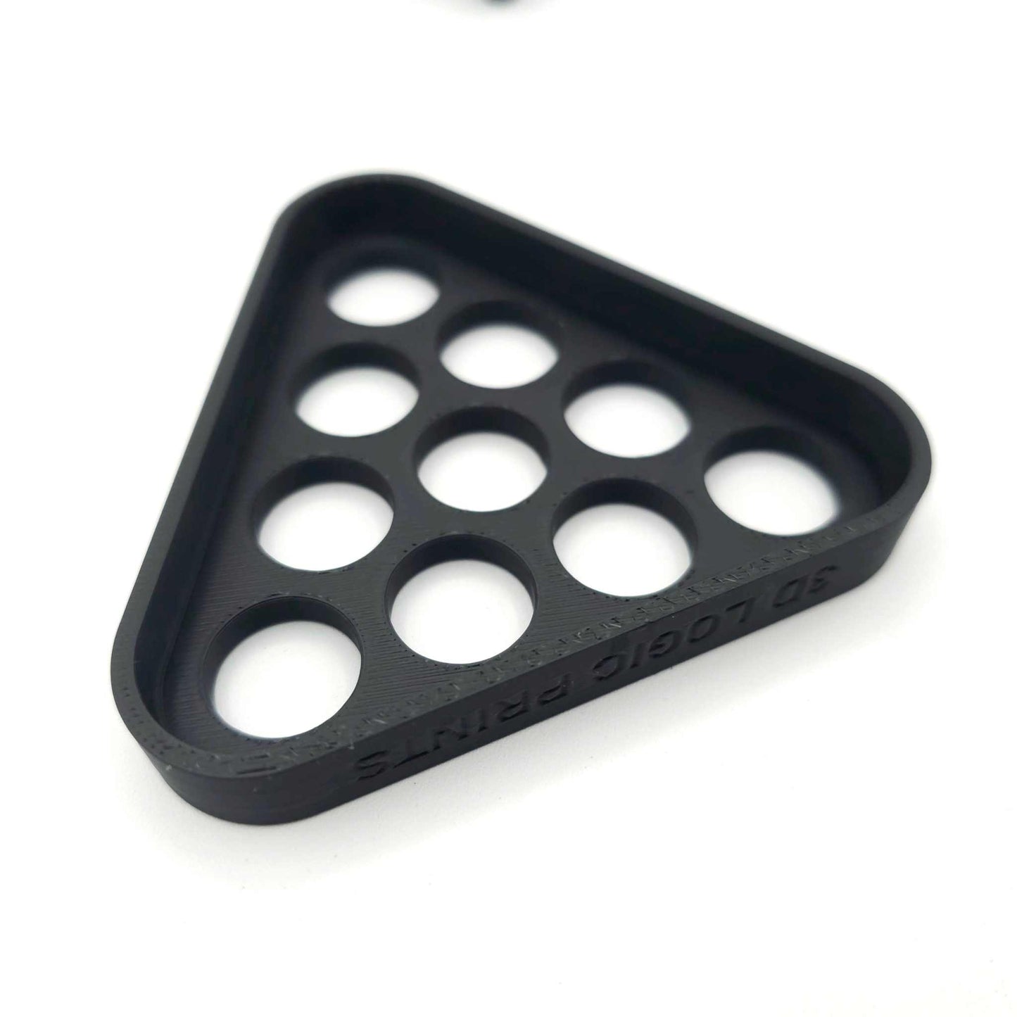 Black 3D-printed mini bowling pin setter with circular slots for arranging pins