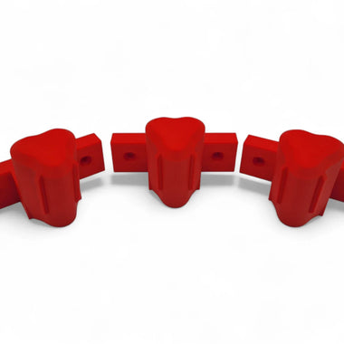 Set of three wall mounts for Milwaukee M12 tools, shown in a secure and organized arrangement.