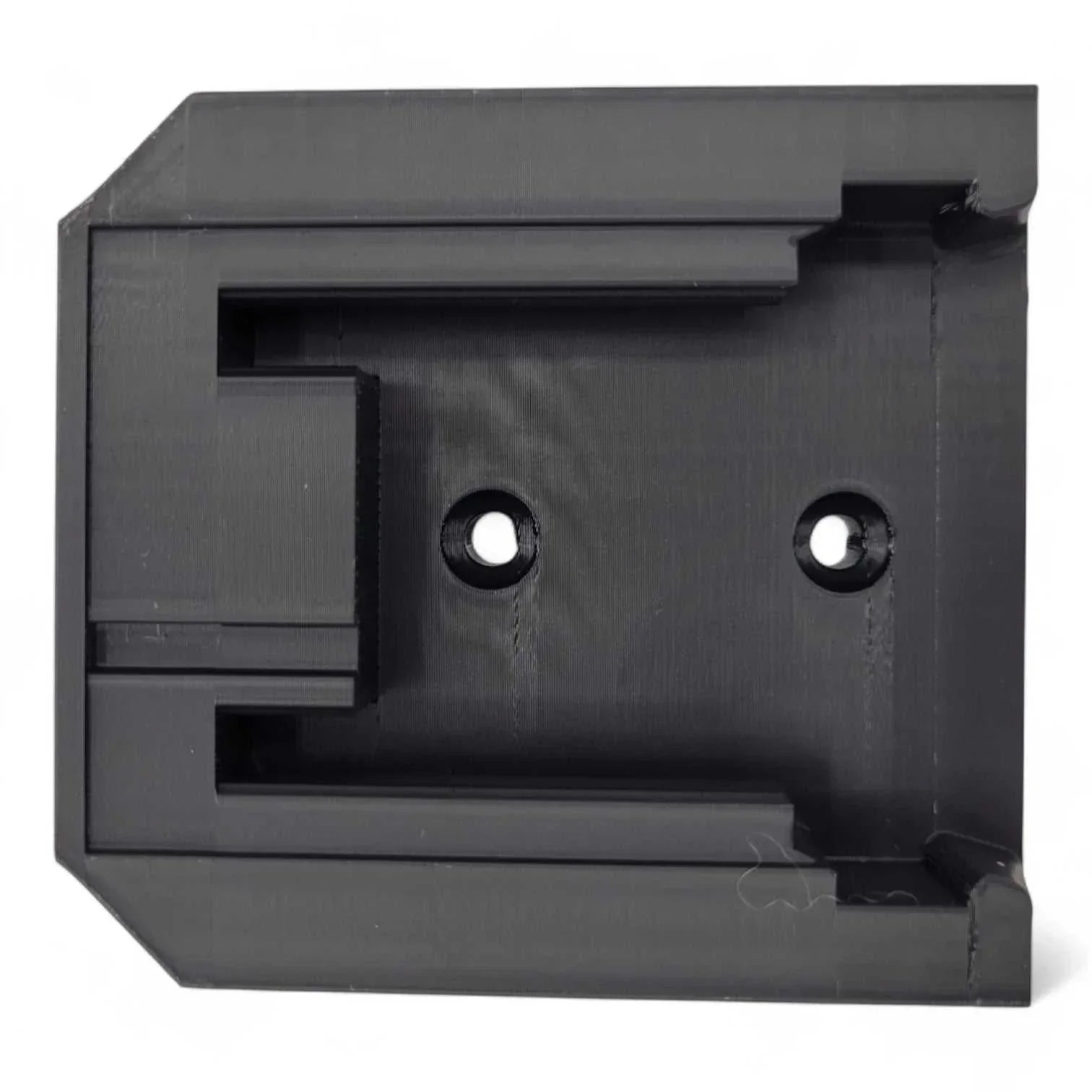 Milwaukee M18 Battery Wall Mount in durable PETG, black, heavy-duty design with two screw holes for secure mounting.