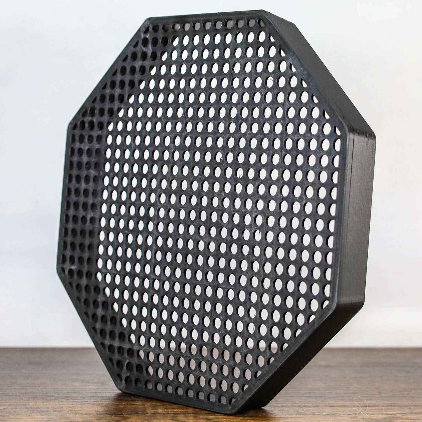 8" octagon black enamel pin board display with perforated holes, wall mount or self-standing design