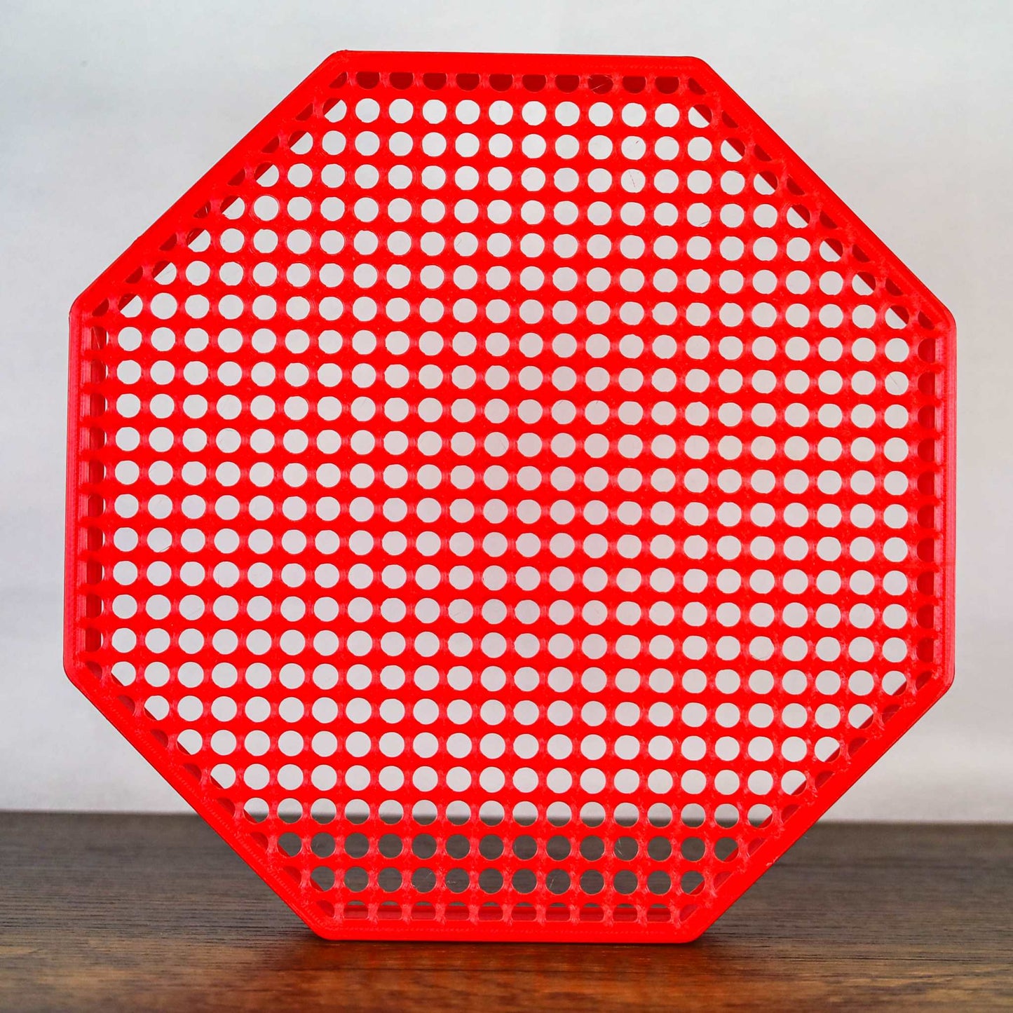 8" Octagon Enamel Pin Board display in red, wall mount or self-standing with perforated design for organizing enamel pins