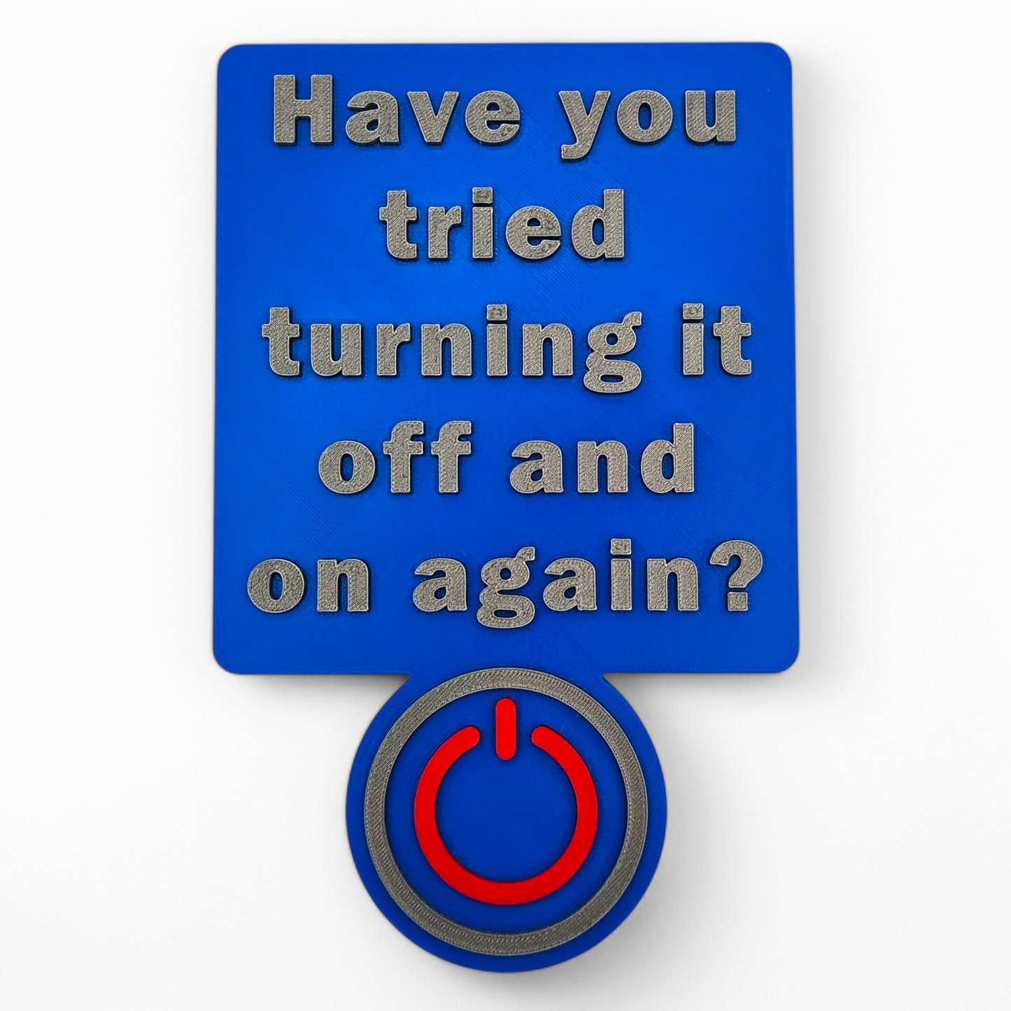 3D printed "Have You Tried Turning It Off and On Again?" tech sign with blue background and red power button icon.